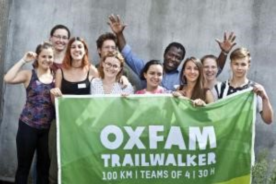 Volunteers with the Oxfam banderole