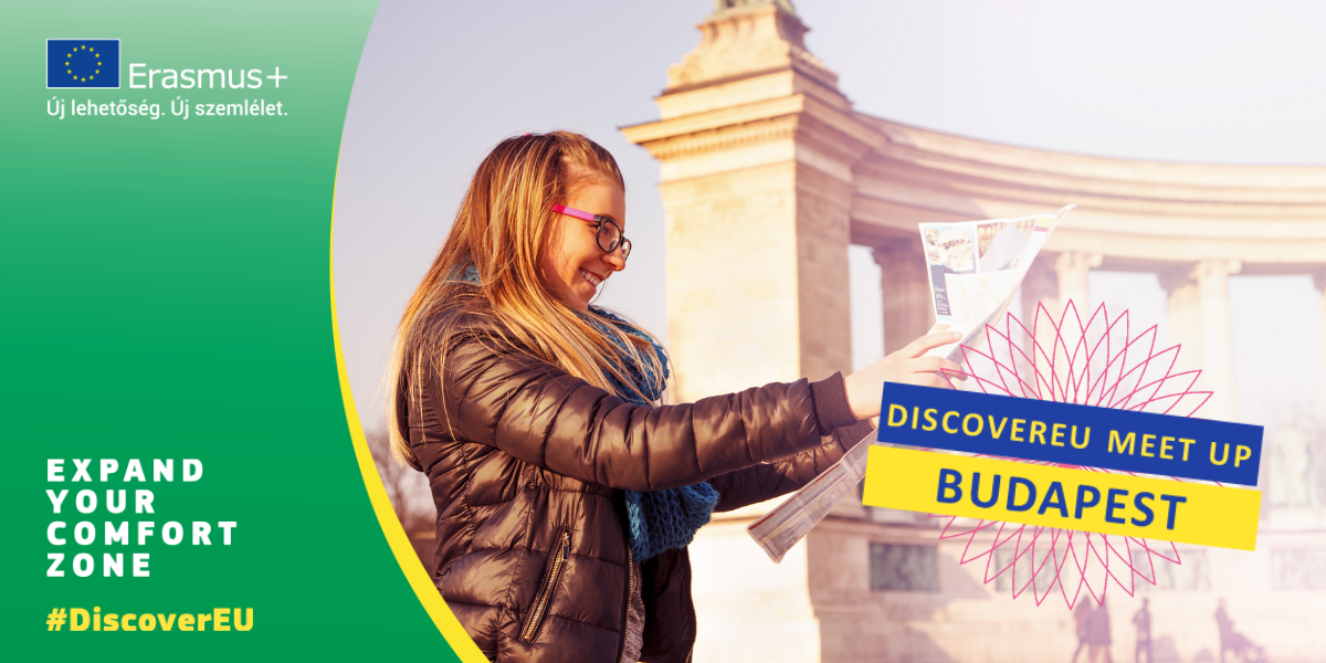 A girl is looking at a map in front of the statues of the Heroes' Square in Budapest.