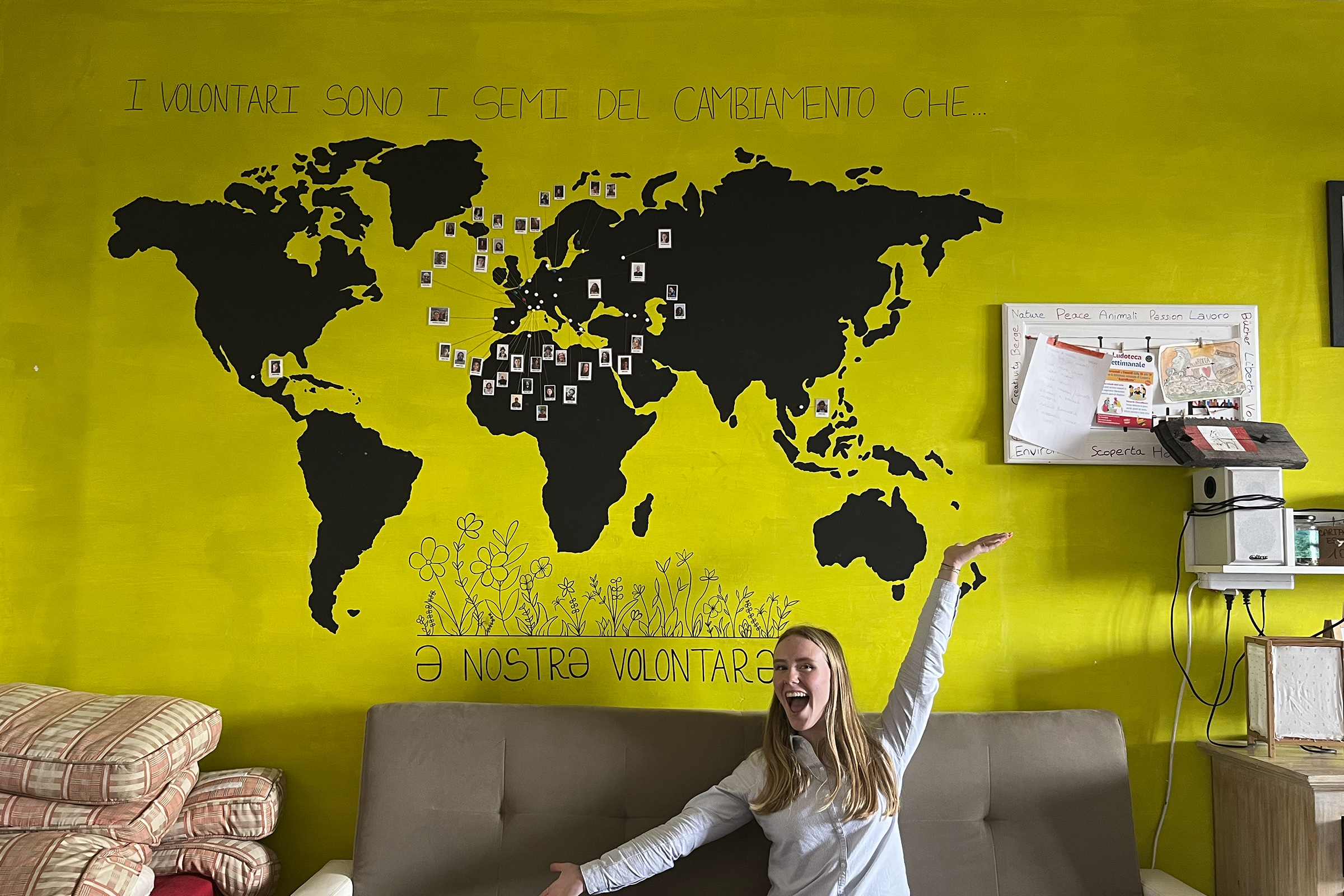 Nanna in front of a map of the world