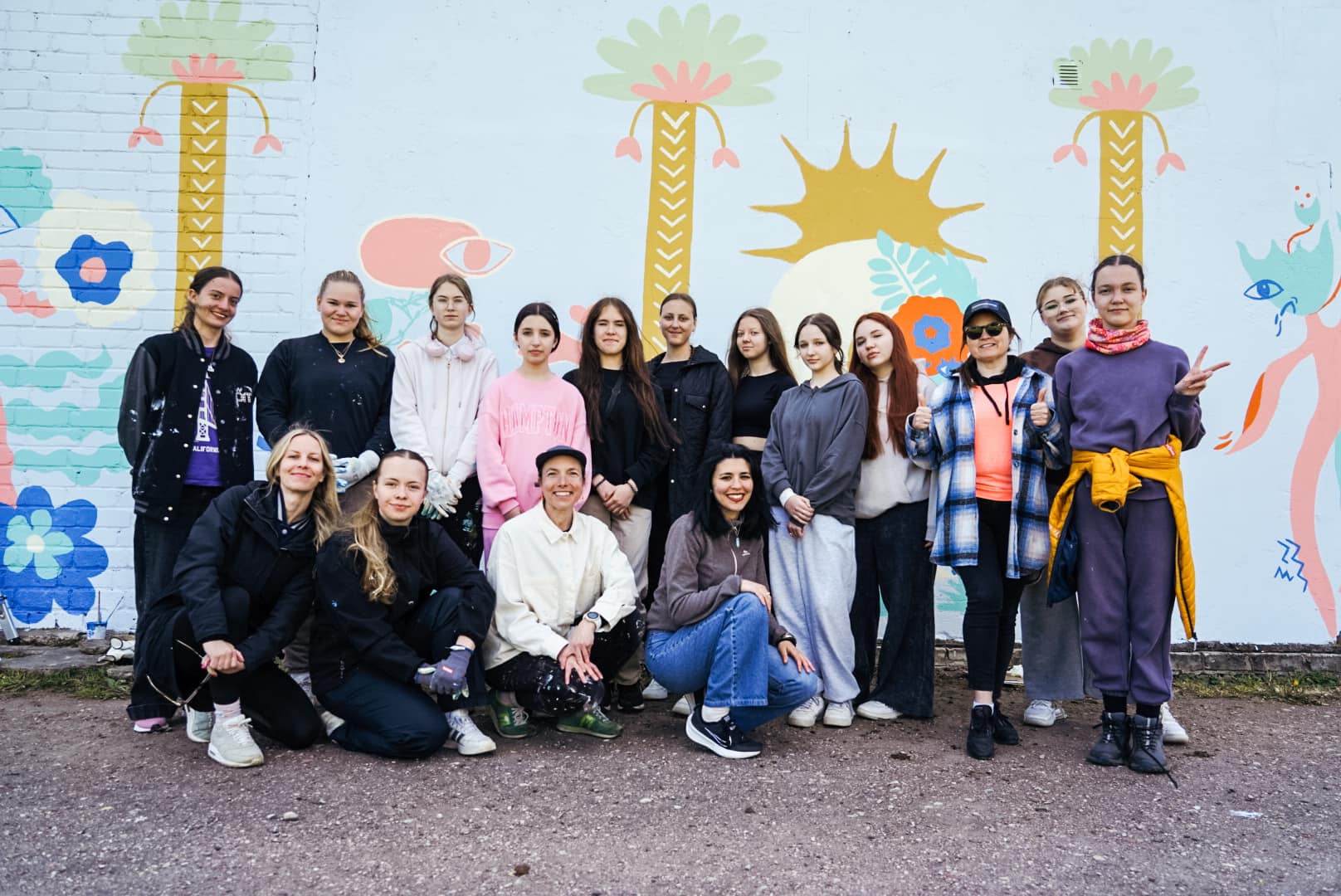 A group of volunteers and participants at the youth centre