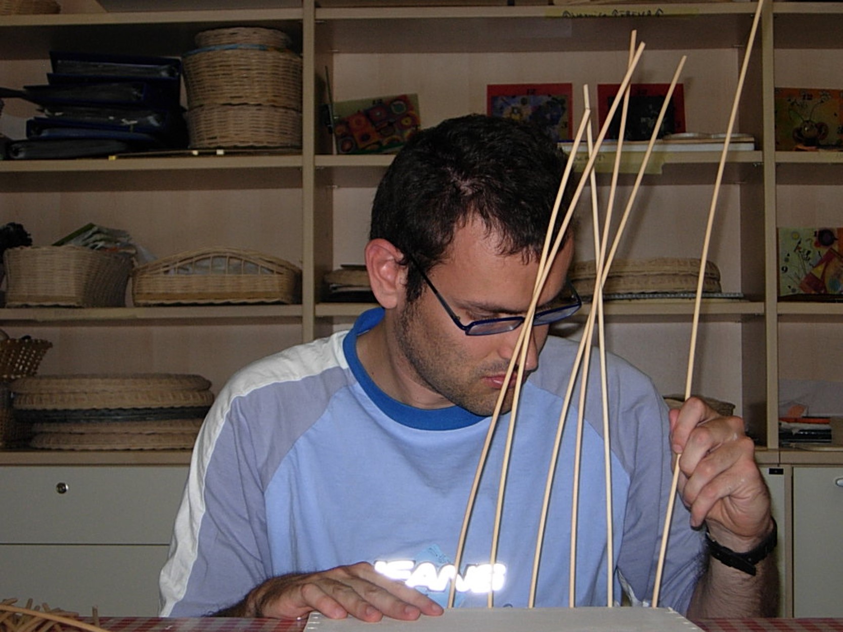Jairo crafting a basket