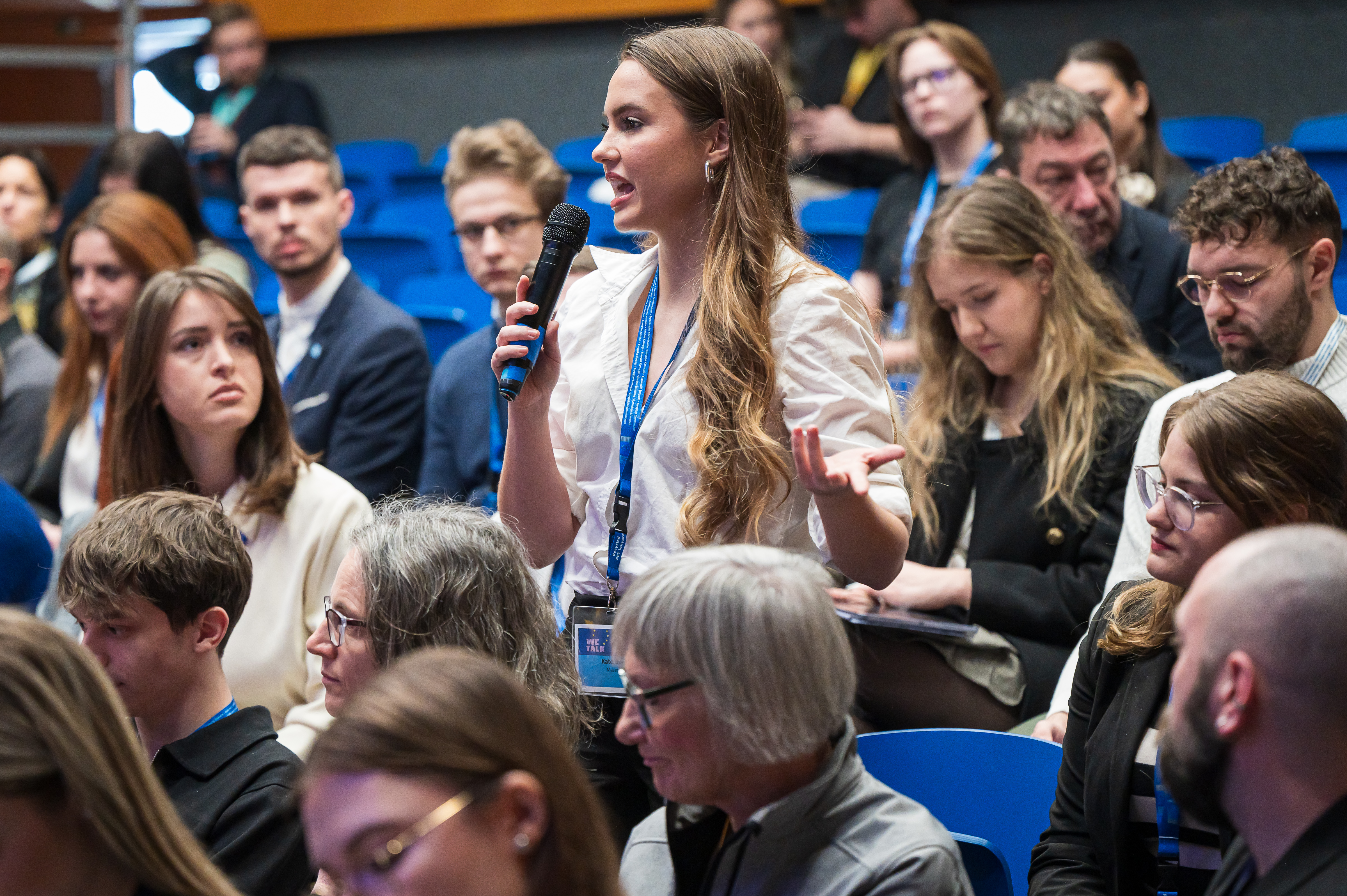 A young participant speaks at the youth policy dialogue