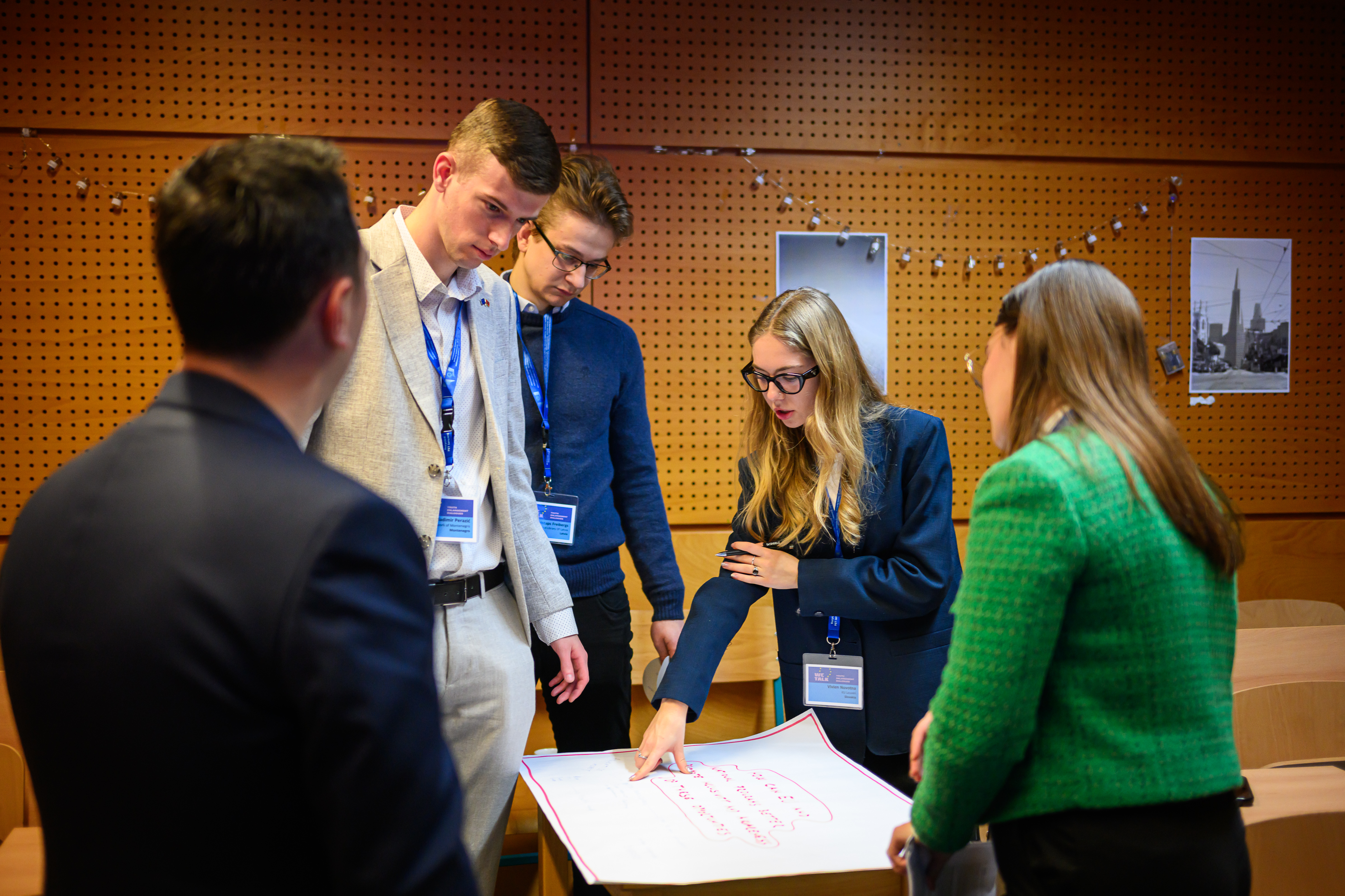 A group of young people brainstorming