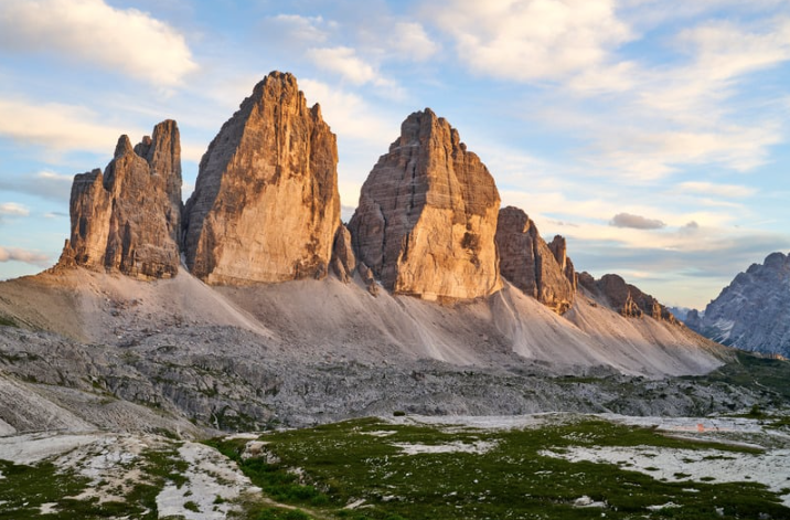 Sunset view by the mountains on the Tre Cime di Lavaredo trail in Italy.