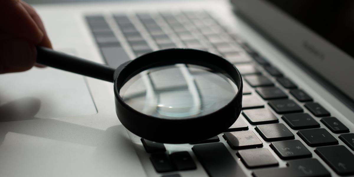 Magnifying glass on a pc keyboard