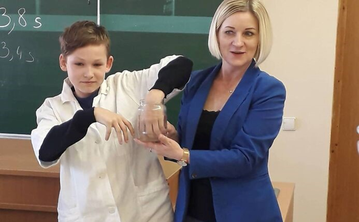 A young person and his teacher. 