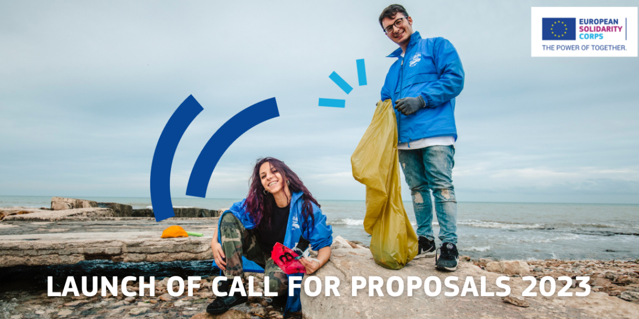 Visual of the European Solidarity Corps & two young persons collecting trash on the beach