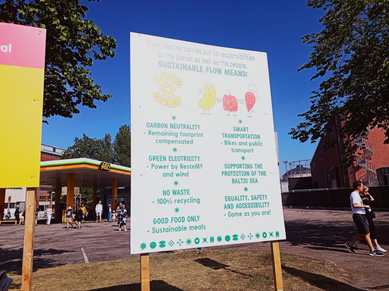 Big board at the entrance of the Flow festival describing the sustainable elements of the festival