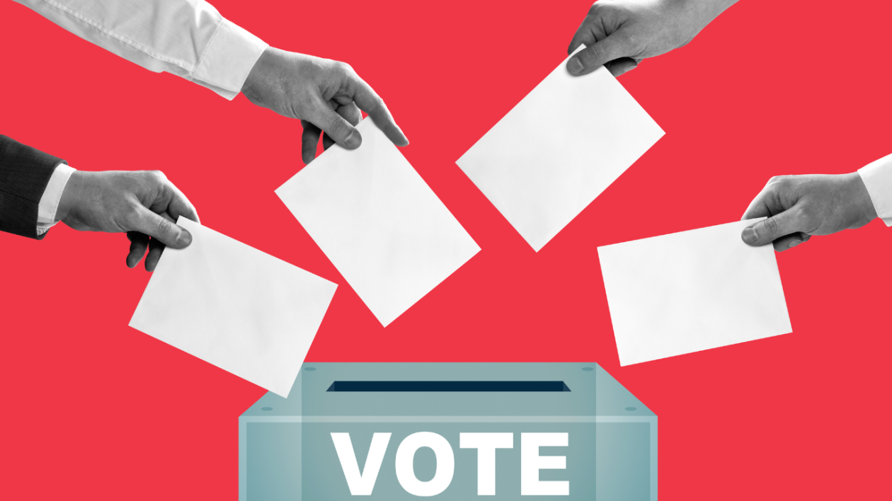 Different hands casting a vote