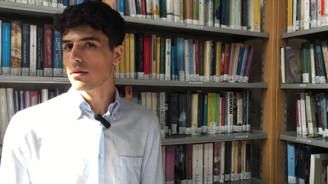 Picture of the author in a library