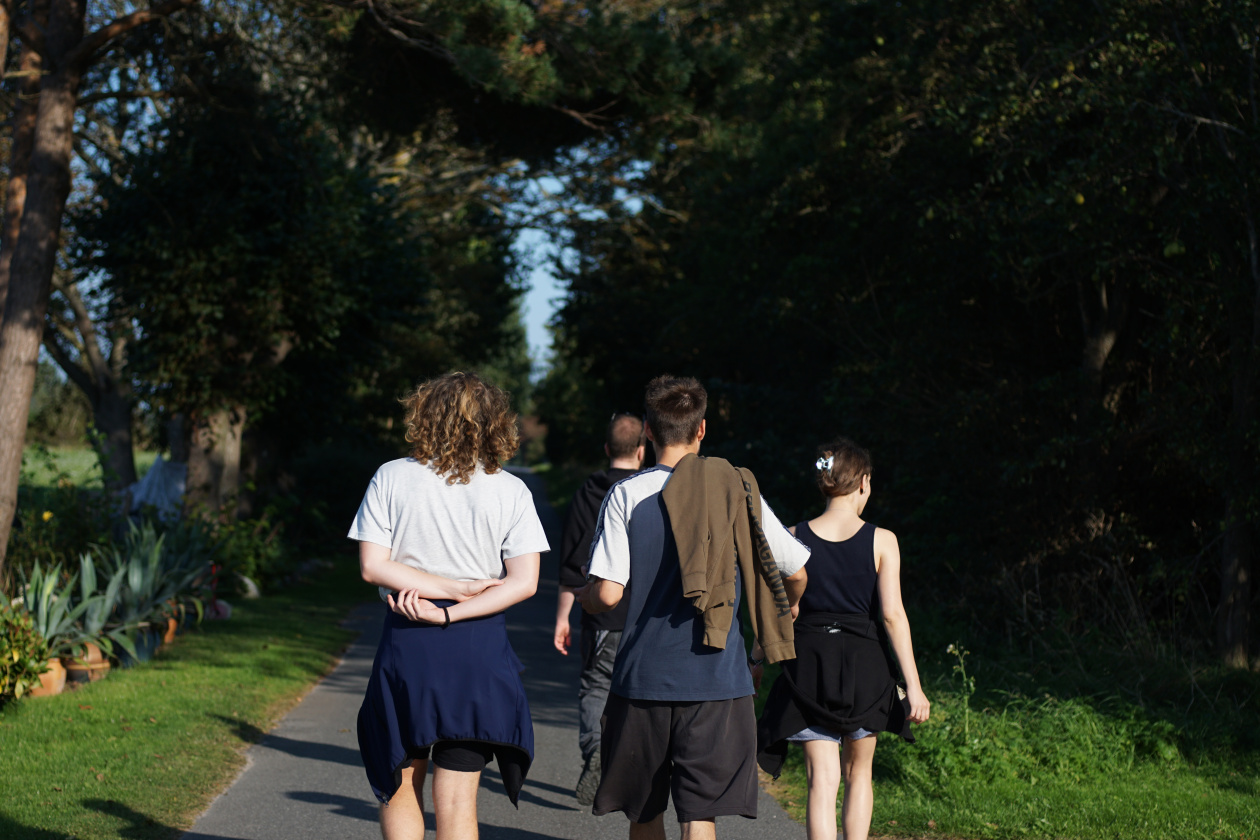 A photograph from the European Solidarity Corps project on Strynø, a little Danish island, the author has participated in. We can see him at the centre with the green hoodie.