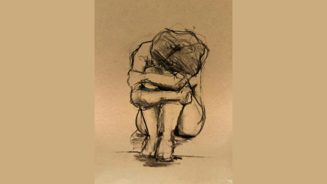 Charcoal sketch of a seated figure with knees bent, arms wrapped around them, head on arms, conveying emotion. Plain background enhances focus on the figure.