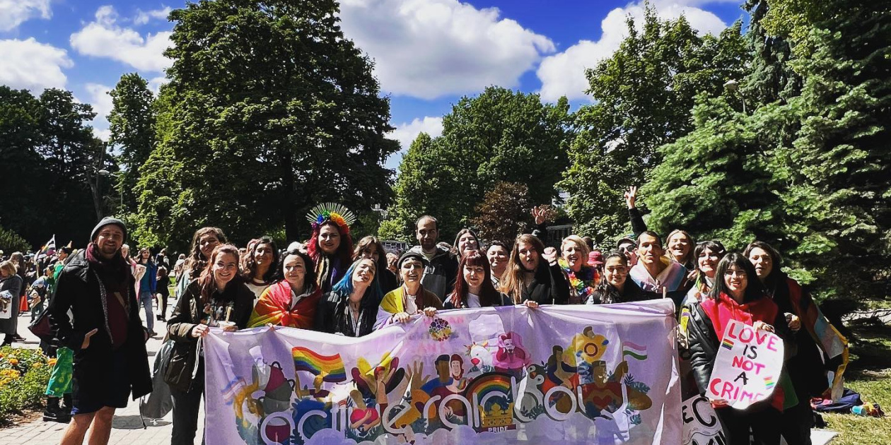 Young people using colourful clothes and celebrating LGBTQIA+ pride