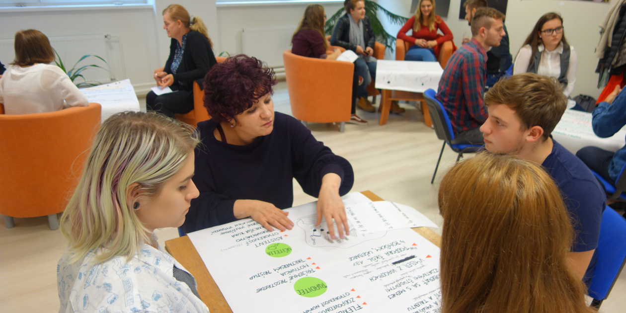 Working in group around a table