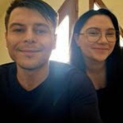 Young girl and boy smile