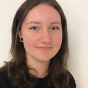 Girl with brown hair and black T-shirt.