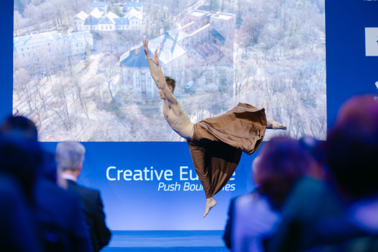 A guy dancing on a stage