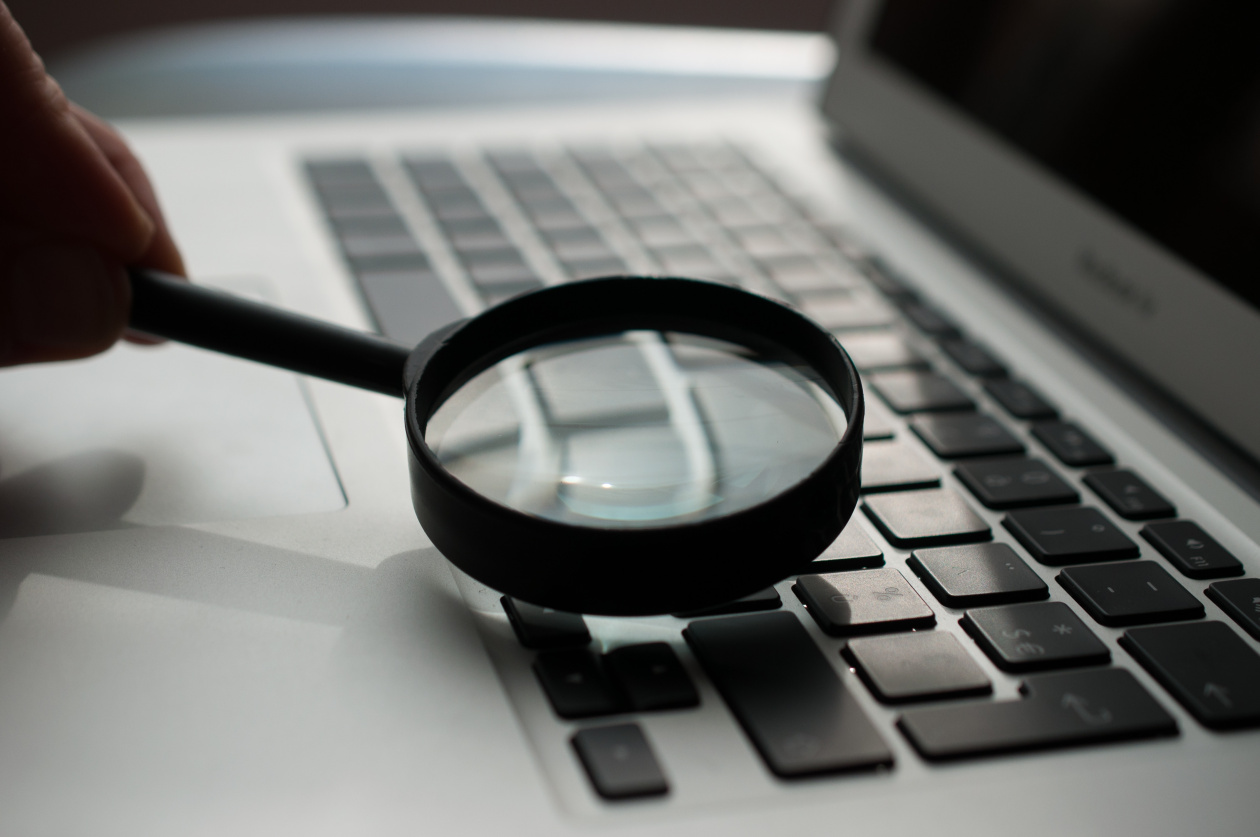 Magnifying glass on a pc keyboard