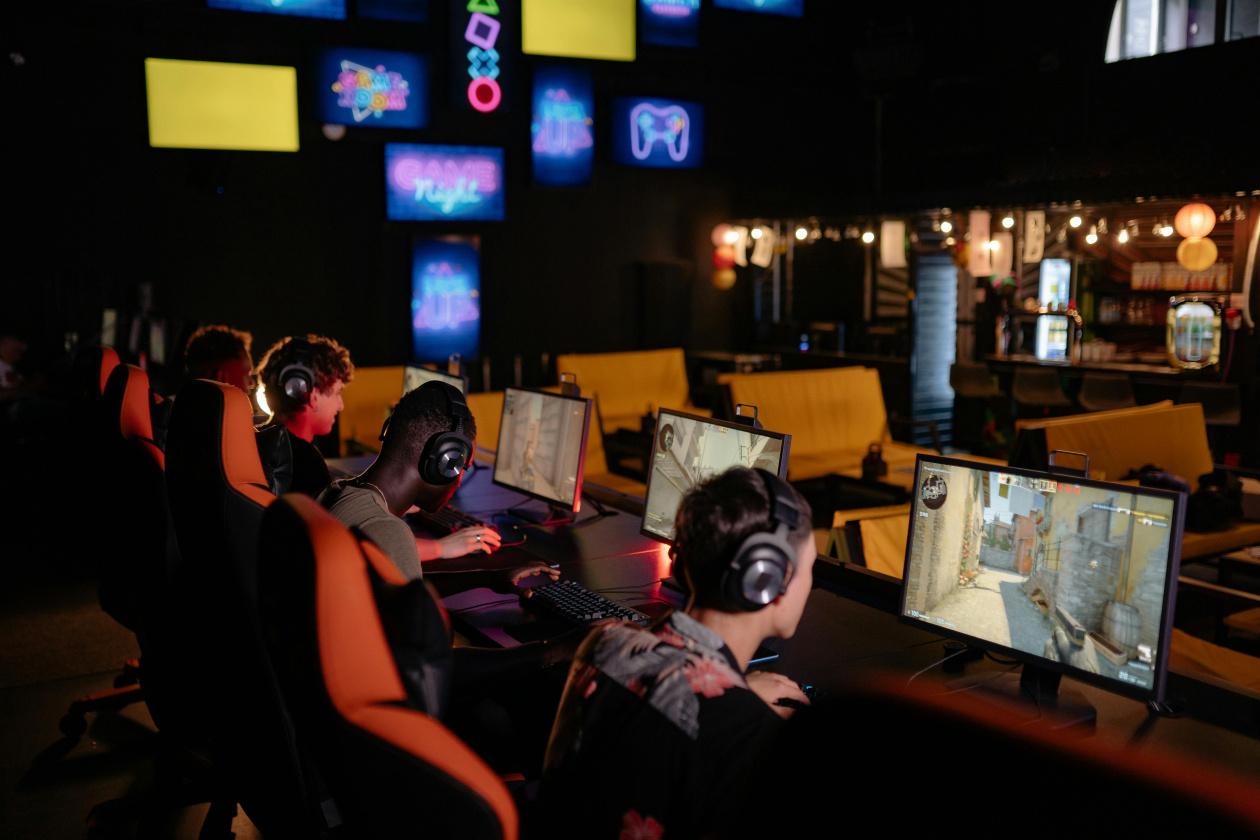 People playing video games on computers