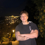 A young man posing for a photo